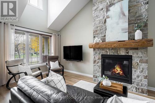 19 Lynden Street, Collingwood, ON - Indoor Photo Showing Living Room With Fireplace