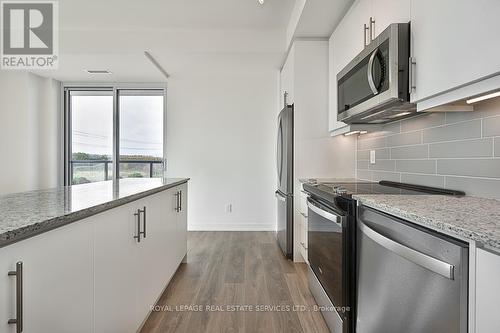 410 - 345 Wheat Boom Drive, Oakville, ON - Indoor Photo Showing Kitchen With Stainless Steel Kitchen With Upgraded Kitchen