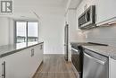 410 - 345 Wheat Boom Drive, Oakville, ON  - Indoor Photo Showing Kitchen With Stainless Steel Kitchen With Upgraded Kitchen 