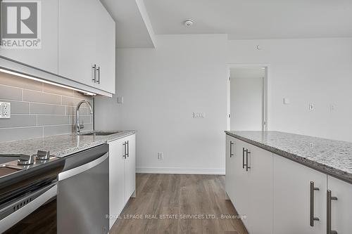 410 - 345 Wheat Boom Drive, Oakville, ON - Indoor Photo Showing Kitchen