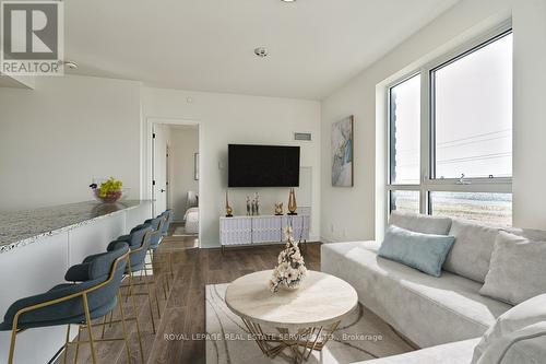 410 - 345 Wheat Boom Drive, Oakville, ON - Indoor Photo Showing Living Room