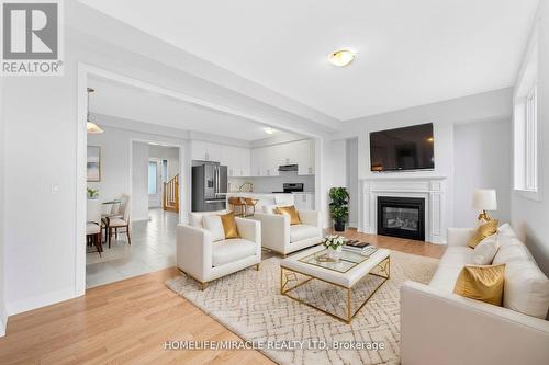 726 Khalsa Drive, Woodstock, ON - Indoor Photo Showing Living Room With Fireplace