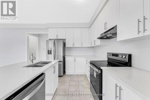 726 Khalsa Drive, Woodstock, ON - Indoor Photo Showing Kitchen With Stainless Steel Kitchen With Double Sink With Upgraded Kitchen