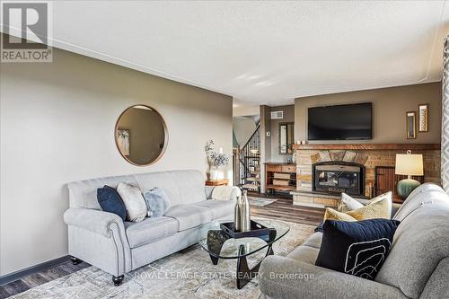 7956 Twenty Road, West Lincoln, ON - Indoor Photo Showing Living Room With Fireplace