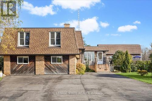 7956 Twenty Road, West Lincoln, ON - Outdoor With Facade