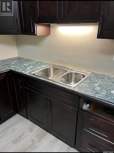 401 St Laurent Crescent, Saskatoon, SK - Indoor Photo Showing Kitchen With Double Sink