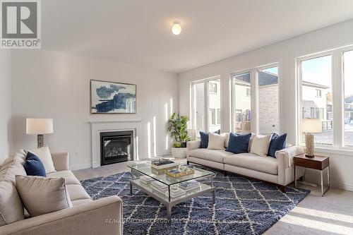 17 Baycroft Boulevard, Essa, ON - Indoor Photo Showing Living Room With Fireplace