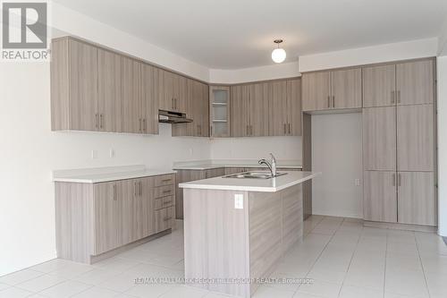 17 Baycroft Boulevard, Essa, ON - Indoor Photo Showing Kitchen With Double Sink