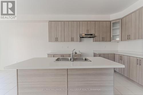 17 Baycroft Boulevard, Essa, ON - Indoor Photo Showing Kitchen With Double Sink