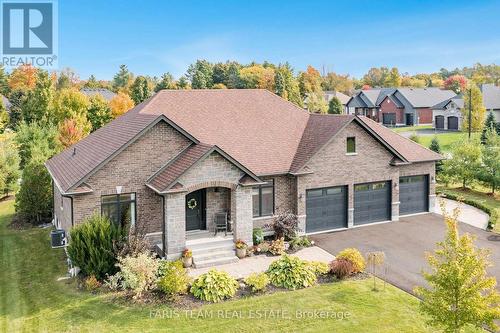 158 Mennill Drive, Springwater, ON - Outdoor With Facade