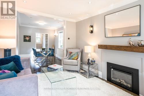 73 Hanna Road, Toronto, ON - Indoor Photo Showing Living Room With Fireplace