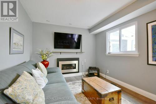 4653 Daniel Street, Ramara, ON - Indoor Photo Showing Living Room With Fireplace