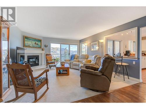 4470 Ponderosa Drive Unit# 103, Peachland, BC - Indoor Photo Showing Living Room With Fireplace