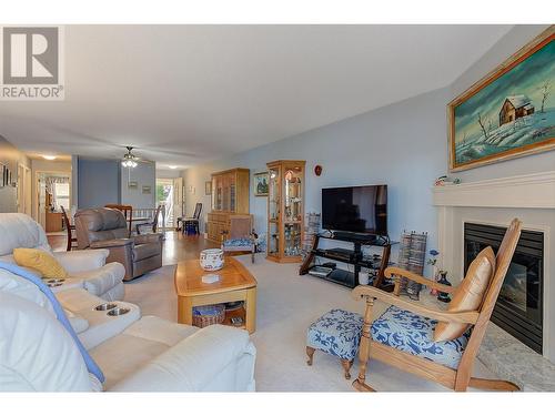 4470 Ponderosa Drive Unit# 103, Peachland, BC - Indoor Photo Showing Living Room With Fireplace