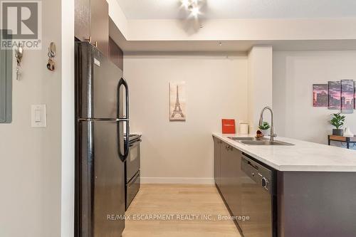 302 - 5020 Corporate Drive, Burlington, ON - Indoor Photo Showing Kitchen With Double Sink