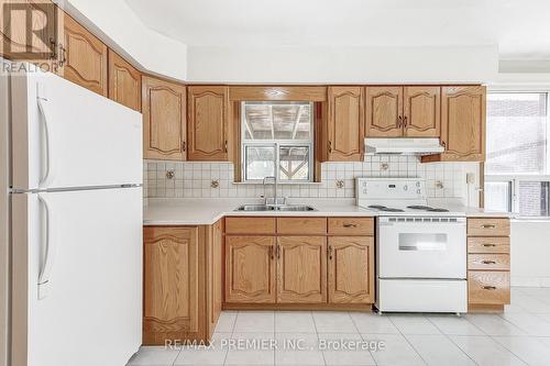 47 Plewes Road, Toronto, ON - Indoor Photo Showing Kitchen With Double Sink