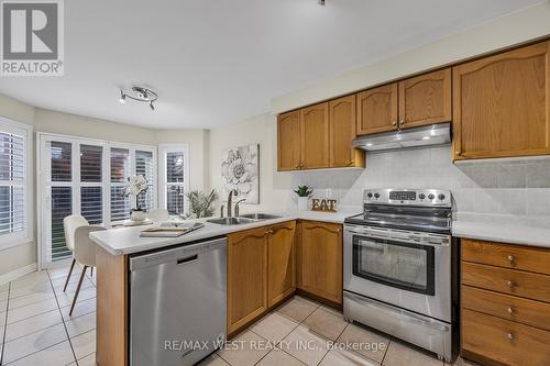 9 Loontail Street, Caledon, ON - Indoor Photo Showing Kitchen With Double Sink