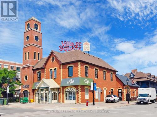 308 - 399 Elizabeth Street, Burlington, ON - Outdoor With Facade