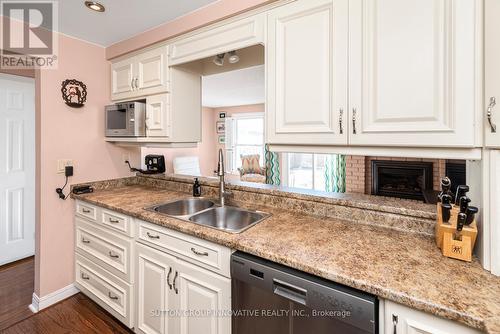 2 - 2052 Brant Street, Burlington, ON - Indoor Photo Showing Kitchen With Double Sink