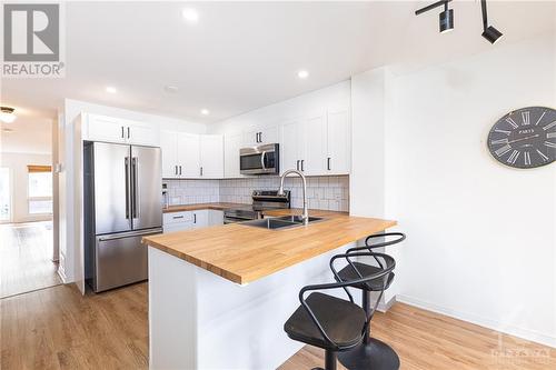 154 Chapman Mills Drive, Ottawa, ON - Indoor Photo Showing Kitchen With Stainless Steel Kitchen With Double Sink