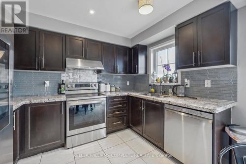 23 Reevesmere Lane, Ajax, ON - Indoor Photo Showing Kitchen With Double Sink