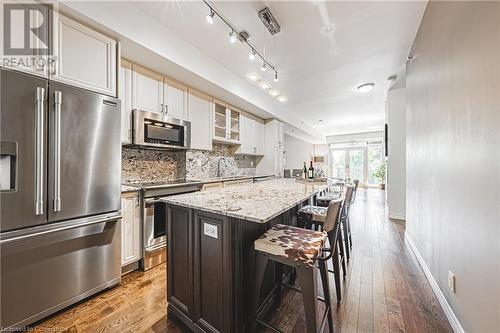 KITCHEN - 34 Plains Road E Unit# 208, Burlington, ON - Indoor Photo Showing Kitchen With Upgraded Kitchen