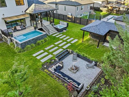 Backyard - 106 Rue Des Pèlerins, Oka, QC - Outdoor With In Ground Pool