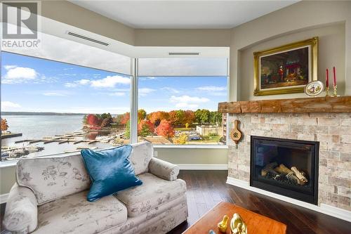 15 St Andrew Street Unit#504, Brockville, ON - Indoor Photo Showing Living Room With Fireplace