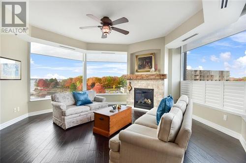 15 St Andrew Street Unit#504, Brockville, ON - Indoor Photo Showing Living Room With Fireplace