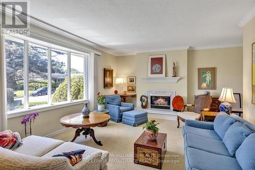 942 Ellesmere Avenue, Peterborough (Northcrest), ON - Indoor Photo Showing Living Room With Fireplace