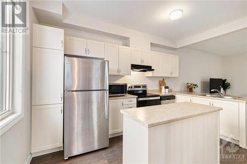 201 Hibernian Walk, Stittsville, ON - Indoor Photo Showing Kitchen With Double Sink