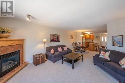 850 Railway Lane Unit# 201, Okanagan Falls, BC - Indoor Photo Showing Living Room With Fireplace