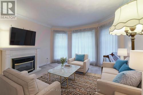 1612 Waddell Avenue, Peterborough (Monaghan), ON - Indoor Photo Showing Living Room With Fireplace