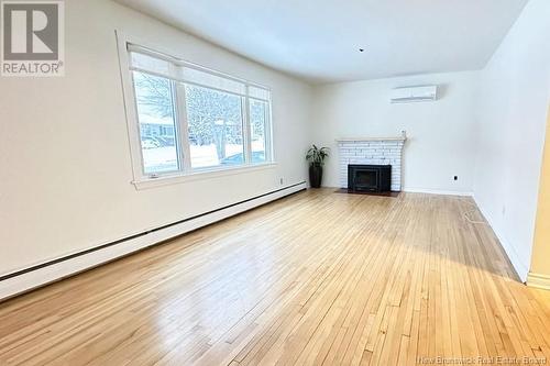 16 Downsview Avenue, Moncton, NB - Indoor Photo Showing Living Room With Fireplace