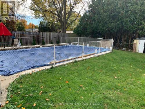 4 Montcalm Street, St. Thomas, ON - Outdoor With Above Ground Pool With Backyard