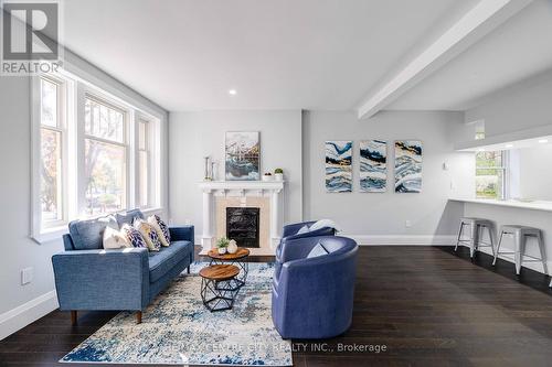 201 - 280 Queens Avenue, London, ON - Indoor Photo Showing Living Room With Fireplace