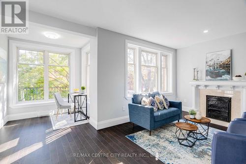 201 - 280 Queens Avenue, London, ON - Indoor Photo Showing Living Room With Fireplace