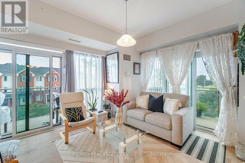 304 - 215 Queen Street E, Brampton, ON - Indoor Photo Showing Living Room