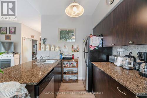 304 - 215 Queen Street E, Brampton, ON - Indoor Photo Showing Kitchen