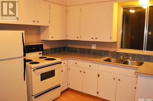 1227-1229 Bond Street, Regina, SK - Indoor Photo Showing Kitchen With Double Sink