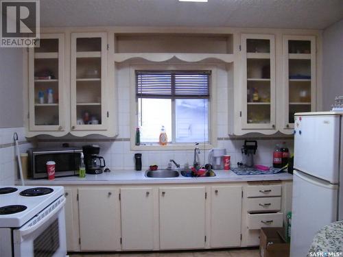 106 1St Avenue, Middle Lake, SK - Indoor Photo Showing Kitchen With Double Sink