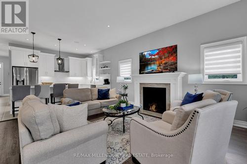 23 Sassafras Row, Fort Erie, ON - Indoor Photo Showing Living Room With Fireplace