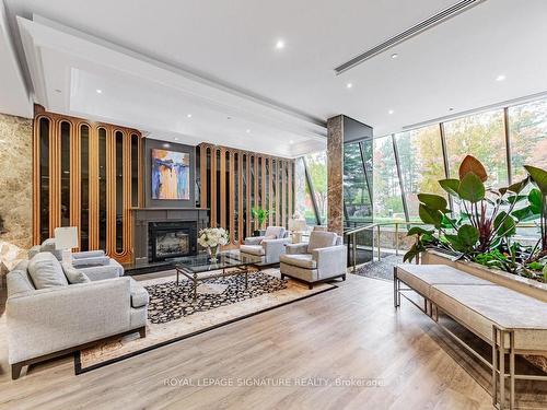 102-1 Concorde Pl, Toronto, ON - Indoor Photo Showing Living Room With Fireplace