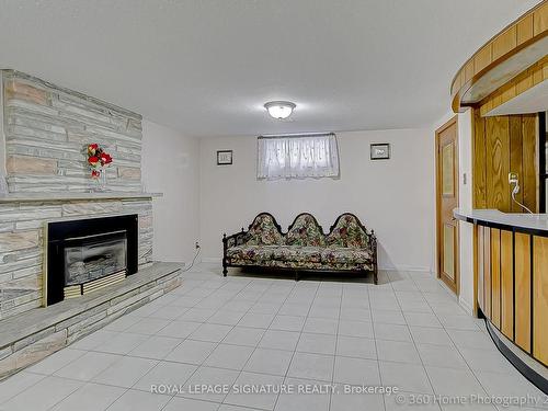 9 Paradelle Cres, Toronto, ON - Indoor With Fireplace