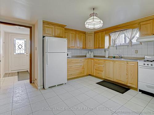 9 Paradelle Cres, Toronto, ON - Indoor Photo Showing Kitchen With Double Sink