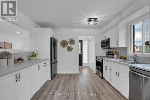 103 Martin Road, Clarington (Bowmanville), ON - Indoor Photo Showing Kitchen With Double Sink