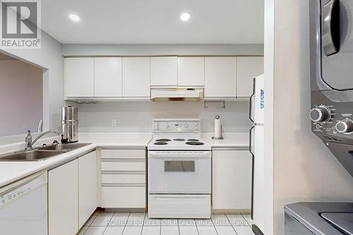 603 - 711 Rossland Road E, Whitby (Pringle Creek), ON - Indoor Photo Showing Kitchen With Double Sink