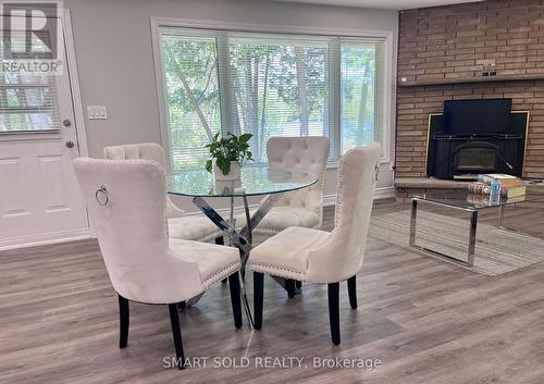 247 Dunnette Landing Road, Alnwick/Haldimand, ON - Indoor Photo Showing Dining Room With Fireplace