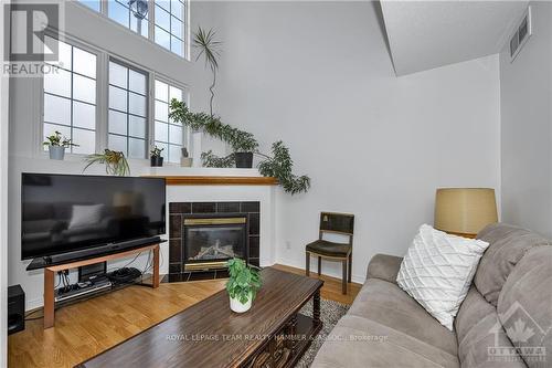 14 - 1701 Blohm Drive, Ottawa, ON - Indoor Photo Showing Living Room With Fireplace