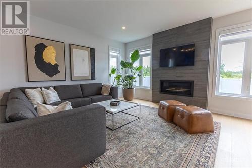 25 Angel Heights, Ottawa, ON - Indoor Photo Showing Living Room With Fireplace